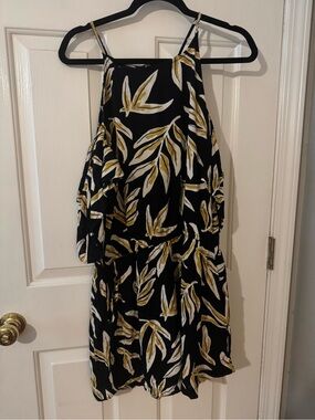 Mud Pie Black Romperwith White and Mustard Leaf Print